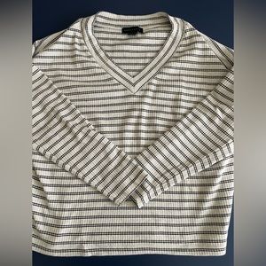 like new, woman’s sweater, size large. White and black.